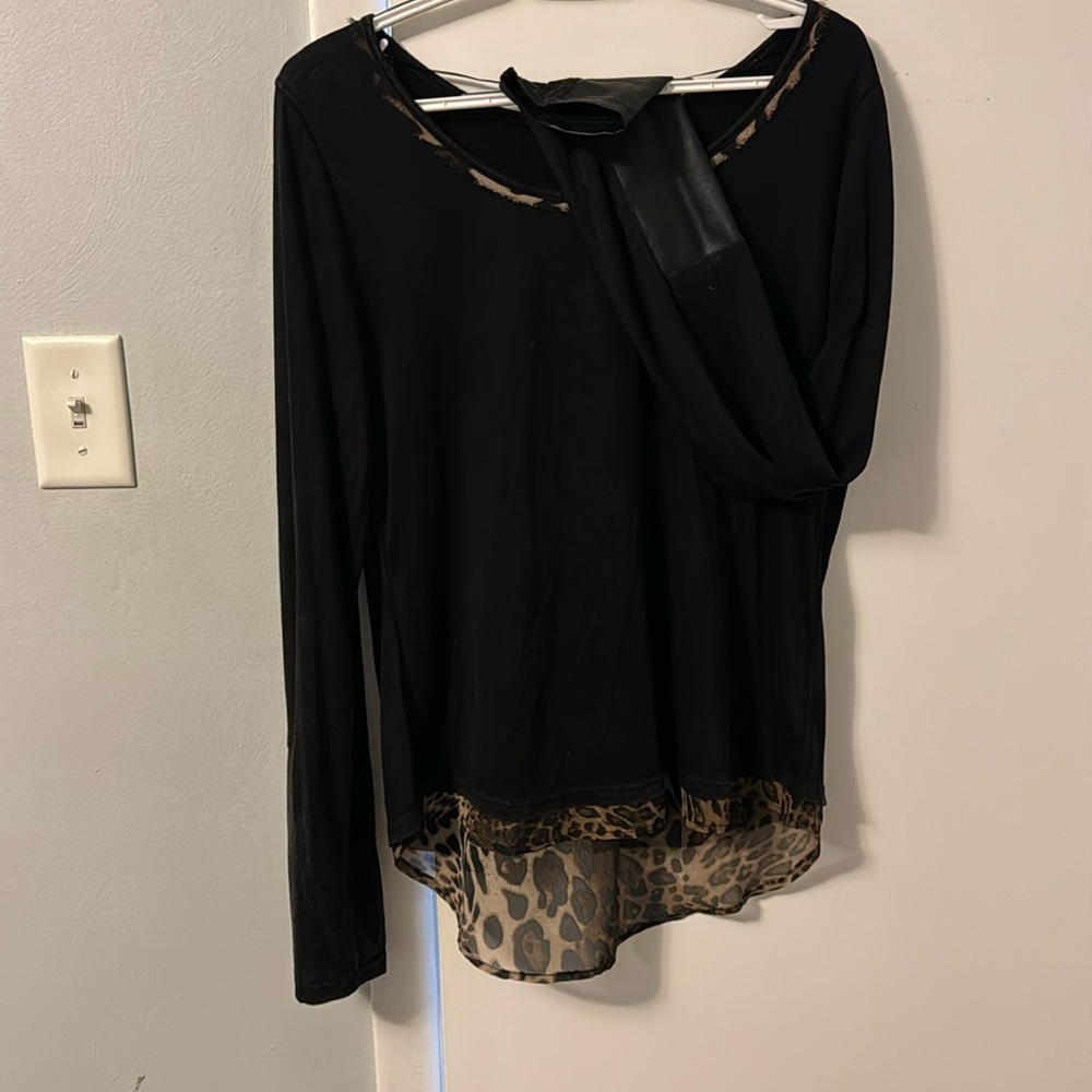 Miss Me black blouse with cheetah lace at neckline and waist line.